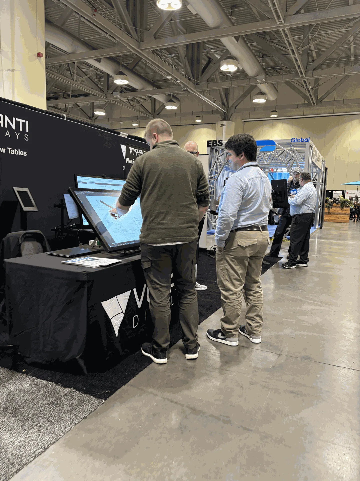Volanti Displays plan review products at trade event